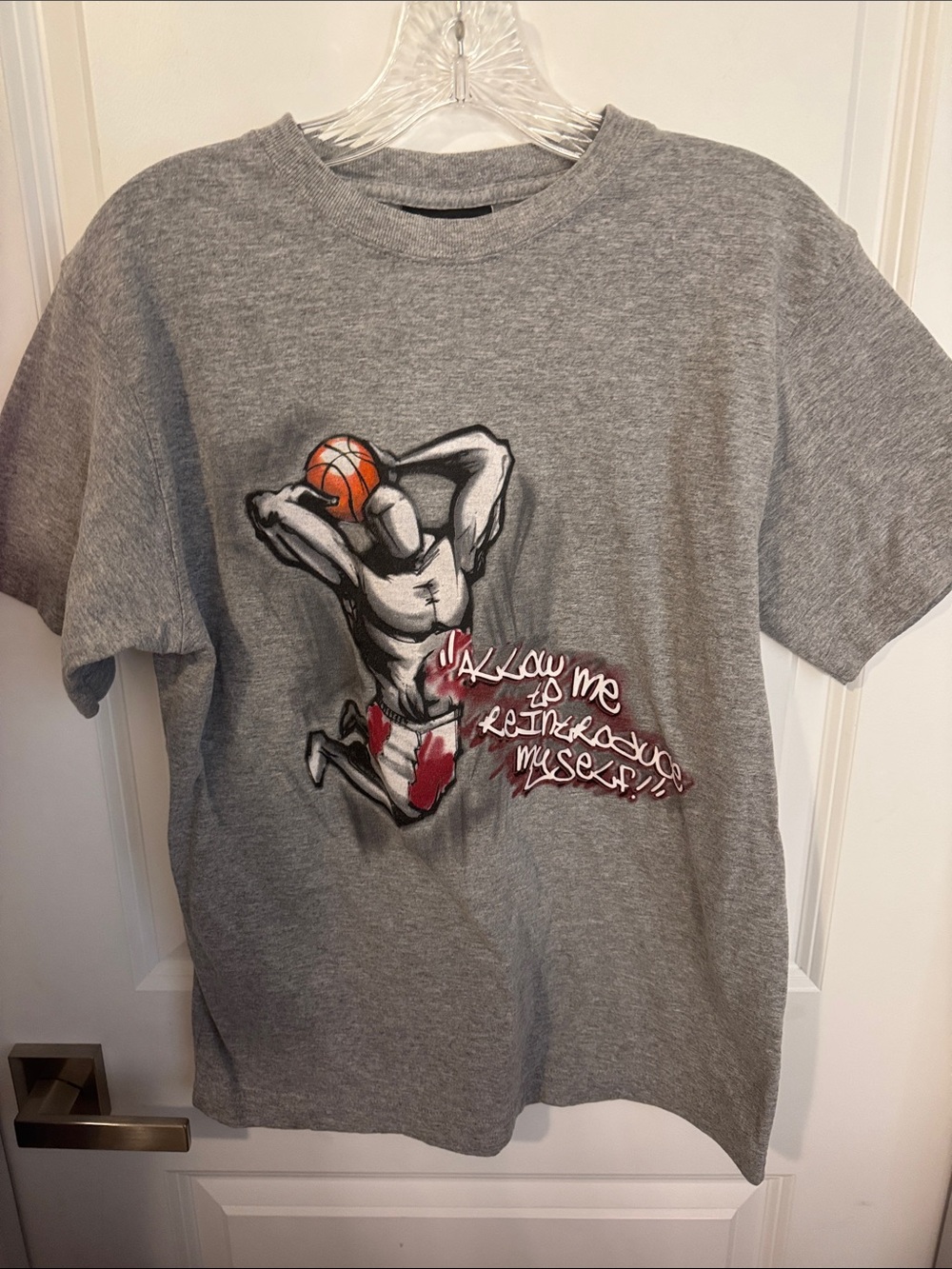 And1 Heather Gray Tee with Basketball Player Graphic and Red Accents